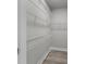 Walk-in closet with wire shelving and wood-look floors at 168 Aleene Dr, Summerville, SC 29485