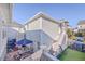 Private backyard patio with seating area and exterior staircase at 2600 Josiah St, Charleston, SC 29492