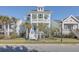 Two-story house with front porch and palm trees at 2600 Josiah St, Charleston, SC 29492