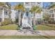 Two-story house with front porch and palm trees at 2600 Josiah St, Charleston, SC 29492