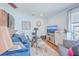 Cozy living room featuring a blue sofa and a cat tree at 2600 Josiah St, Charleston, SC 29492
