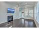 Bright living room with fireplace, hardwood floors, and access to balcony at 2600 Josiah St, Charleston, SC 29492