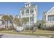 Two-story house with front porch and palm trees at 2600 Josiah St, Charleston, SC 29492
