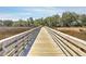 Wooden boardwalk path leading through marsh grass at 2600 Josiah St, Charleston, SC 29492