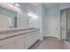 Bathroom with granite countertop, double vanity, and large shower at 2600 Josiah St, Charleston, SC 29492