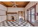 Charming community room with wood floors and fireplace at 1735 Atlantic Ave, Sullivans Island, SC 29482