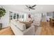 Bright living room with hardwood floors and large windows at 1894 Capri Dr, Charleston, SC 29407
