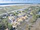 Aerial view of waterfront property, showcasing the home and surrounding neighborhood at 1894 Capri Dr, Charleston, SC 29407