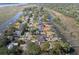Aerial view showing home's location on a waterway with neighboring houses and docks at 1894 Capri Dr, Charleston, SC 29407