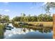 Peaceful waterfront view with boats and serene marsh scenery at 1894 Capri Dr, Charleston, SC 29407