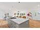 Open concept kitchen with large island and white countertops at 1894 Capri Dr, Charleston, SC 29407