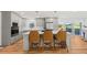 Updated kitchen with gray cabinets, island, and hardwood floors at 1894 Capri Dr, Charleston, SC 29407