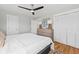 Bright bedroom with large bed, dresser, and spacious closet at 1894 Capri Dr, Charleston, SC 29407