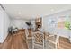 Spacious dining area with glass table and seating for six at 1894 Capri Dr, Charleston, SC 29407
