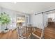 Bright dining area with glass table and French doors leading to patio at 1894 Capri Dr, Charleston, SC 29407