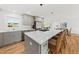 Modern kitchen with gray cabinets, quartz countertops, and island at 1894 Capri Dr, Charleston, SC 29407
