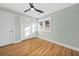 Light and airy bedroom with hardwood floors, ceiling fan and window at 1894 Capri Dr, Charleston, SC 29407