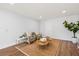 Relaxing living room with comfortable seating and hardwood floors at 1894 Capri Dr, Charleston, SC 29407