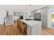 Modern kitchen with gray cabinets, white countertops, and island at 1894 Capri Dr, Charleston, SC 29407