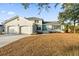 Charming brick home with two-car garage and landscaped yard at 1894 Capri Dr, Charleston, SC 29407