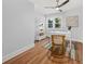 Bright home office featuring a desk, chair, and hardwood floors at 1894 Capri Dr, Charleston, SC 29407