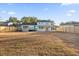 Large backyard with grassy area and a view of the home's back elevation at 1894 Capri Dr, Charleston, SC 29407