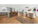 Spacious open floor plan with hardwood floors and kitchen island at 1894 Capri Dr, Charleston, SC 29407