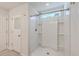 Bathroom with a shower and built-in shelving at 2250 Kemmerlin St, Johns Island, SC 29455