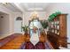 Formal dining room with hardwood floors, chandelier and large windows at 4294 Club Course Dr, North Charleston, SC 29420