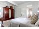 Spacious bedroom with antique armoire and hardwood floors at 8 Savage St, Charleston, SC 29401