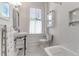 Clean bathroom with subway tile and pedestal sink at 8 Savage St, Charleston, SC 29401