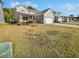 Two story home with attached garage and front yard at 2996 Conservancy Ln, Charleston, SC 29414