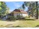 Brick house exterior with mature landscaping and large yard at 428 Carn St, Walterboro, SC 29488
