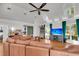 Spacious living room with hardwood floors, large windows, a fireplace, and a sectional sofa at 428 Carn St, Walterboro, SC 29488