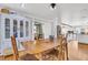 Bright dining room with a wooden table and chairs, adjacent to the kitchen at 428 Carn St, Walterboro, SC 29488