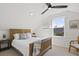 Charming attic bedroom with wooden bed frame and window seat at 3 Penn Ave, Charleston, SC 29407
