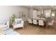 Open concept dining area with kitchen and living room views at 7636 Indigo Palms Way, Johns Island, SC 29455