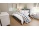 Cozy bedroom with a comfortable bed and ample natural light at 7636 Indigo Palms Way, Johns Island, SC 29455