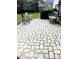Relaxing brick patio with seating and grill at 3 Penn Ave, Charleston, SC 29407