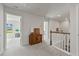 Upstairs hallway with carpeted floors and access to bedrooms at 718 Newbury St, Summerville, SC 29486