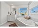 Bathroom with corner soaking tub and water views at 718 Newbury St, Summerville, SC 29486