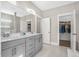 Bathroom with dual vanity, walk-in closet, and tiled floor at 2902 Clearwater Dr, Mount Pleasant, SC 29466