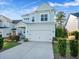 Two-story light blue house with a two-car garage at 2902 Clearwater Dr, Mount Pleasant, SC 29466