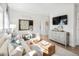 Cozy game room with a comfortable sofa and large TV at 1718 Cultivation Lane St # 536, Mount Pleasant, SC 29466