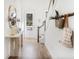Bright foyer with hardwood floors and elegant decor at 1718 Cultivation Lane St # 536, Mount Pleasant, SC 29466