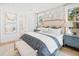 Main bedroom with patterned bedding and plenty of natural light at 1718 Cultivation Lane St # 536, Mount Pleasant, SC 29466