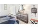 Modern bedroom with dresser, wall decor, and a cozy atmosphere at 1718 Cultivation Lane St # 536, Mount Pleasant, SC 29466