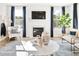 Bright living room features a fireplace, large windows, and comfortable seating at 1718 Cultivation Lane St # 536, Mount Pleasant, SC 29466