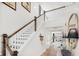 Elegant staircase with dark wood railing and open floor plan at 1718 Cultivation Lane St # 536, Mount Pleasant, SC 29466