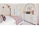 Peaceful bedroom with a bed and dresser with natural light at 1718 Cultivation Lane St # 536, Mount Pleasant, SC 29466